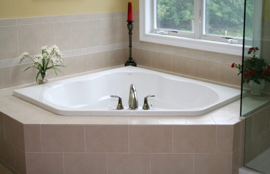 gallery photo of white tile spa bath 