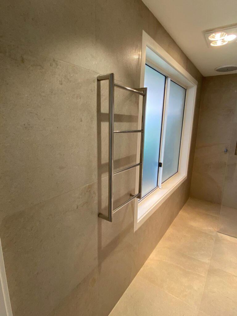 photo gallery window in light filled bathroom